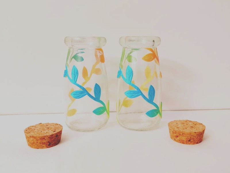 Painted Vases with glass bottles